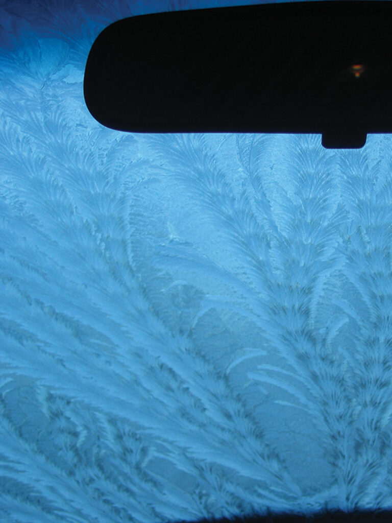 My windshield before starting out in another snowstorm.