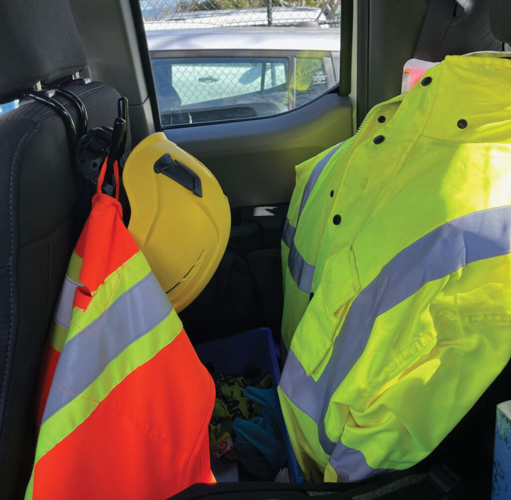 Keeping rain gear and reflective gear in your truck is a good idea if you have to get out, so you can be seen by other drivers.
