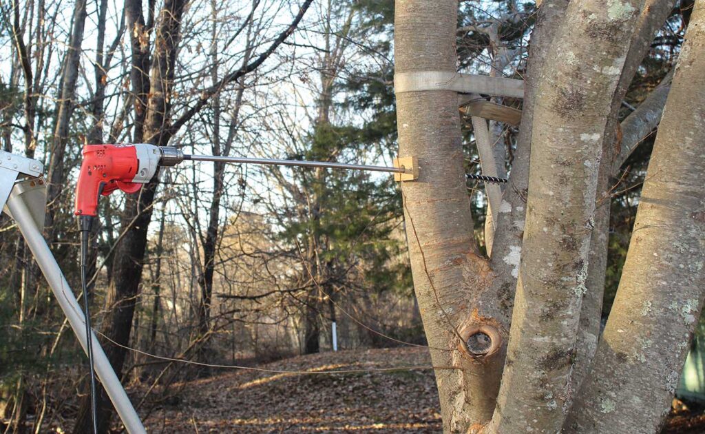 Photo 9: The half-inch electric drill was underpowered for the task, but would do.