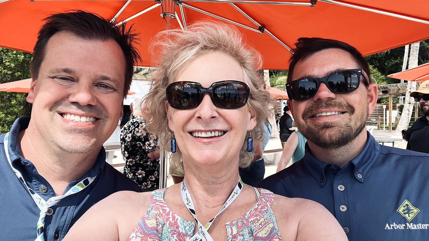 Hemingway with Patrick Turley, left, and Stephen Carlson, both with Arbor Masters Tree Service, at the Women in Tree Care event held at Winter Management Conference, February 2025.